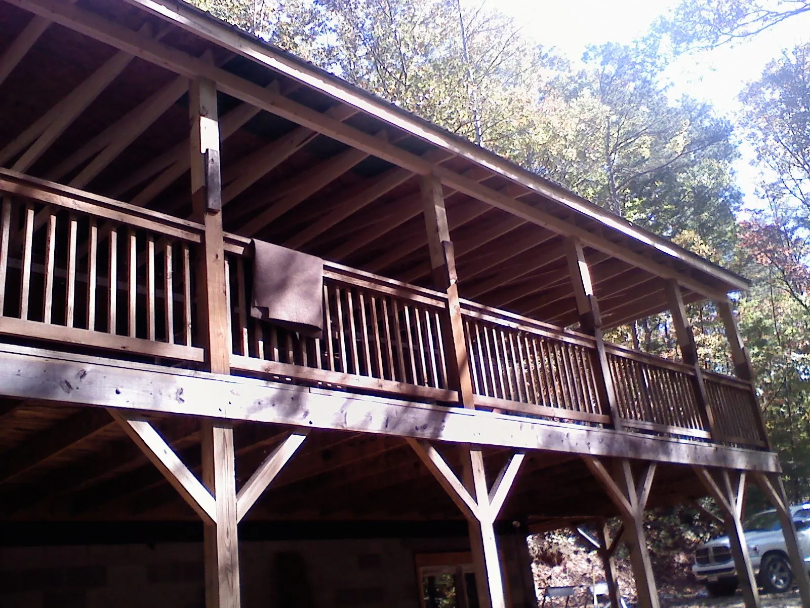 Timber framing under a new elevated porch and deck — Roof Leak Repair in Corfu by Roofing Brothers